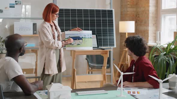 Female Engineer Giving Presentation about Renewable Energy to Coworkers / Videohive, Stock footage, Business corporate