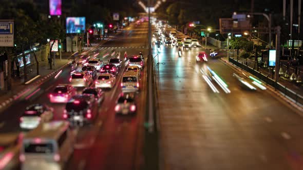 timelaps night, traffic on the roads of the city, many cars in the big city