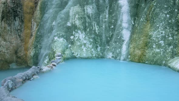 Geothermal pool and hot spring in Tuscany, Italy. Bagni San Filippo natural thermal waterfall in the
