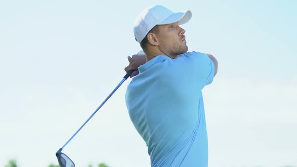 Self Satisfied Man Making Full Swing on Teeing Ground, First Hit at Tournament