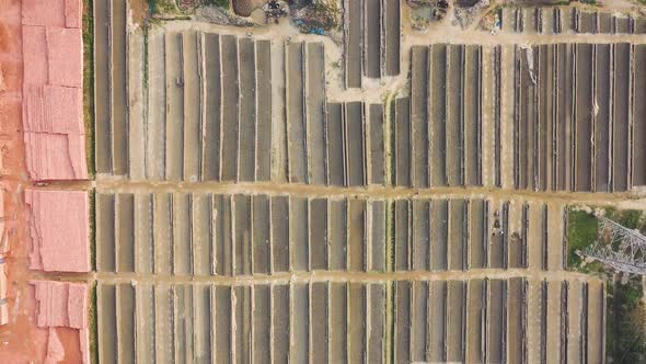 Aerial view of people working in a brick factory, Dhaka, Bangladesh.