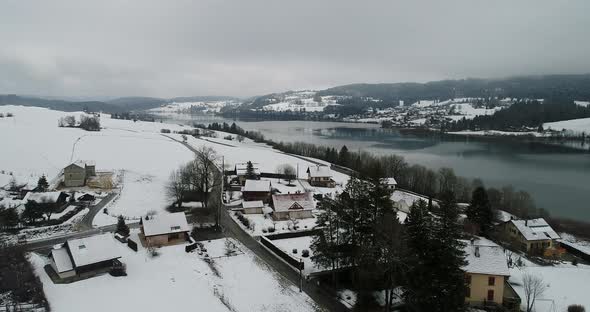 Village of Saint-Point-Lac in Doubs in France seen from the sky alt