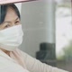 Lonely Asian old woman looking outside the window, Stay home for quarantine. - VideoHive Item for Sale
