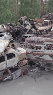 Vertical Video of a Dump of Destroyed Cars During the War in Ukraine