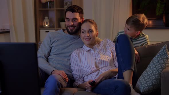 Son Scaring His Father and Mother Watching Tv