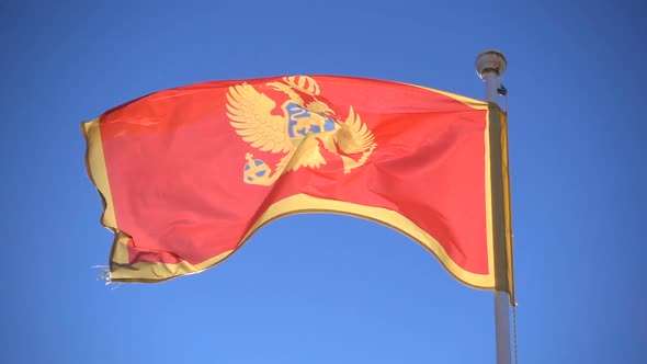 Montenegro Flag Flying in the Background of the Sky