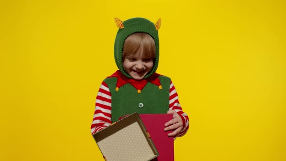 Kid Girl in Christmas Elf Santa Helper Costume Getting Receiving Present Gift Box