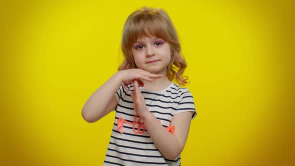 Serious Blonde Child Girl Showing Time Out Gesture Limit or Stop Sign No Pressure i Need More Time