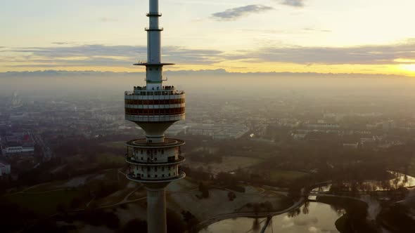 Aerial shot over Olympiaturm tower in Munich Germany