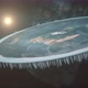 Flat Earth in cosmos. Close-up of flat planet slowly spins in space. Modern flat Earth in Universe - VideoHive Item for Sale