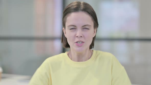 Portrait of Young Woman Shouting Screaming