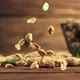 Peeled Peanuts Fall on the Table - VideoHive Item for Sale