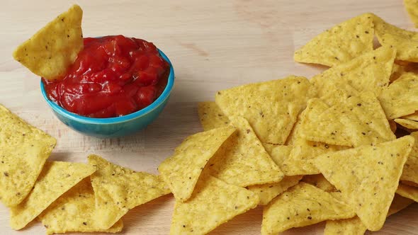 Tortilla chips with spicy tomato salsa