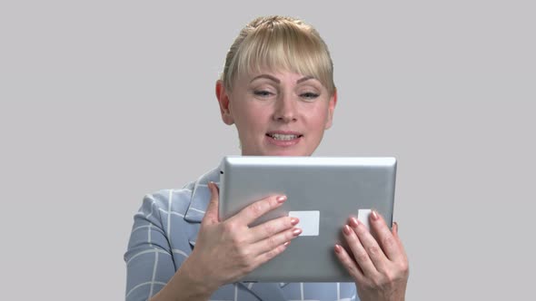Pretty Woman Using Digital Tablet