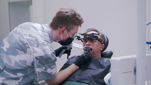 the Patient Makes a Seal on the Tooth