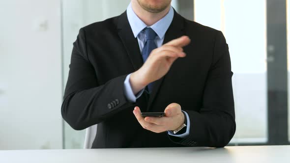 Businessman Working with Smartphone at Office 23