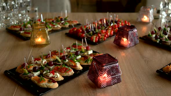 Delicious Snacks and Appetizers on Banquet Table