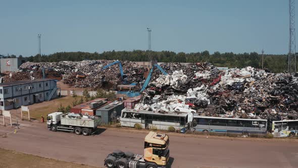 Old Wrecked Cars in Junkyard Waiting to Be Shredded in a Recycling Park