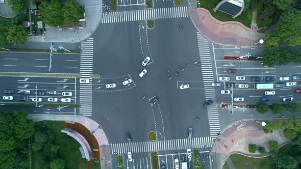 Aerial Drone Shot of Crossroad in the City Cars and Buses Driving By Avenue