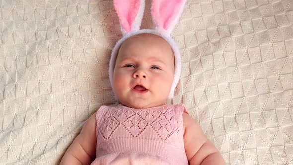 Funny Little Child is Wearing Bunny Ears