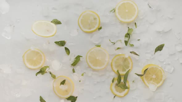 Lemon Slices with Ice and Leaf Mint Jump Summer Lemonade Tonic and Soda Juice