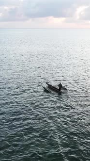 Vertical Video Boats in the Ocean Near the Coast of Zanzibar Tanzania