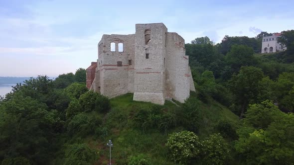 Zoom Shot of Historical Building Situated on Green Hill