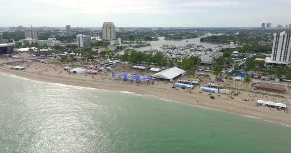 5k Aerial Swooping Shot Of The Tortuga Music Festival On Fort Lauderdale Beach Florida