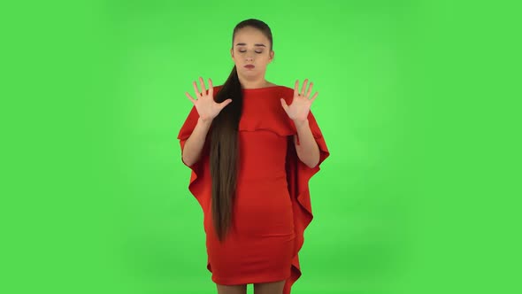 Pretty Young Woman Is Relaxing, Meditating. Green Screen