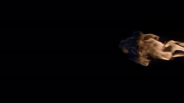 Super Slow Motion Shot of Fire Flame Isolated on Black Background