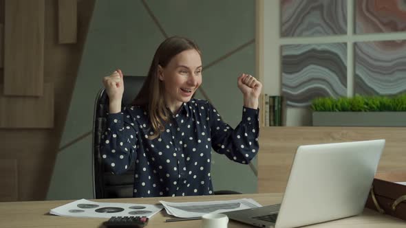 Young Woman Working Using Computer Laptop  Dollars Coming Down Like Rain