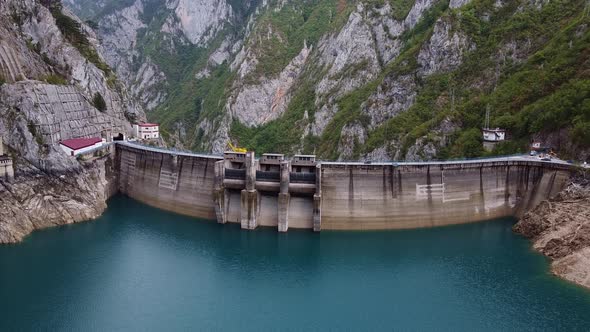 Drone View of Water Dam High in Mountains