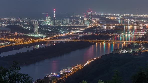 Skyline of Vienna From Danube Viewpoint Leopoldsberg Aerial Night Timelapse