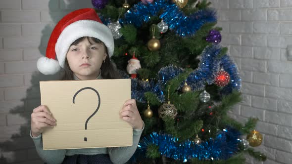 Child doubting Christmas.