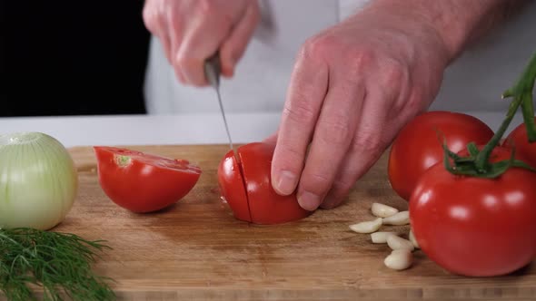 Chopping Tomatoes on Table