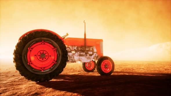 Vintage Retro Tractor on a Farm in Desert