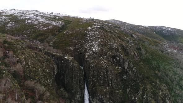 Waterfall in Winter in the Snow