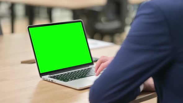 Hands of Businessman Using Laptop with Chroma Screen