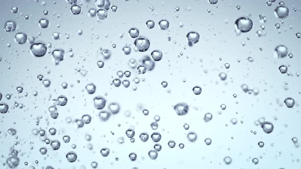 Super Slow Motion Shot of Rising Various Bubbles in Water at 1000 Fps