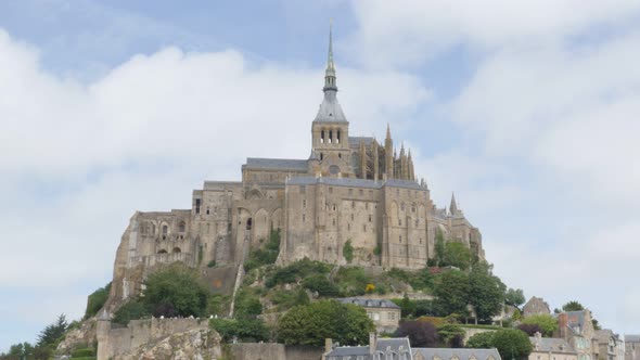 Mont Saint Michel in  front of blue sky  Normandy France 4K 3840X2160 UHD video - Mt Saint Michel fa