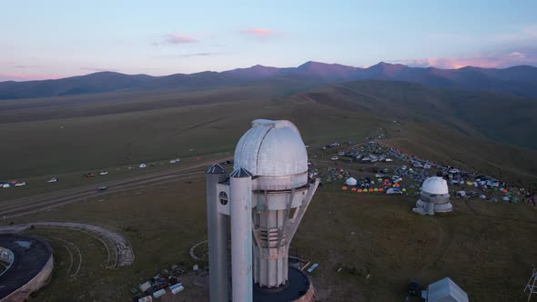 Two Large Telescope Domes at Sunset