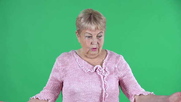 Portrait Elderly Woman Looking at the Camera with Surprise and Delight