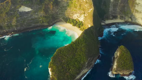 Aerial Drone View of Blue Ocean View of Seashore at Manta Bay or at Kelingking Beach on Nusa Penida