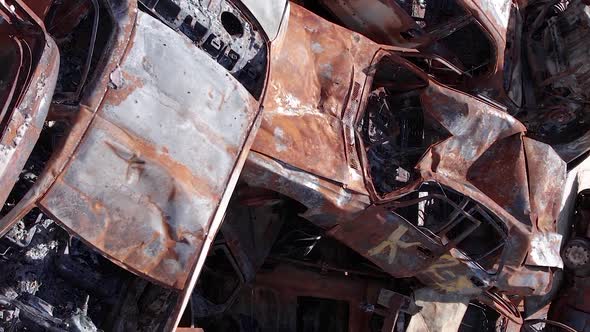 Vertical Video Irpin Bucha District  Destroyed Cars During the War in Ukraine