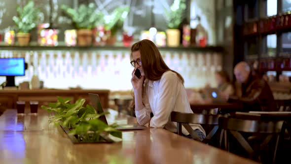 Young Business Girl In Cafe