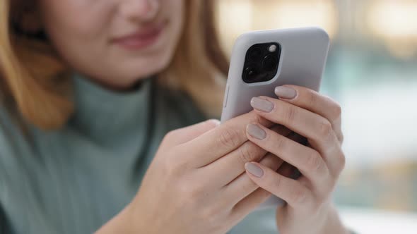 Closeup of Female Hands with Mobile Phone Unrecognizable Caucasian Woman Girl Typing Swipes Browsing