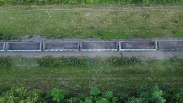 Aerial view of a freight train carrying empty