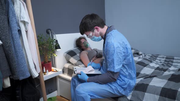 Paramedic Gives Oxygen to an Unconscious Young Woman