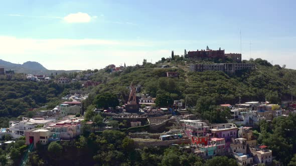 AERIAL: Guanajuato City and The Pipila, Mexico (Flying Around)