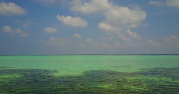 Beautiful birds eye copy space shot of a white paradise beach and turquoise sea background in high r